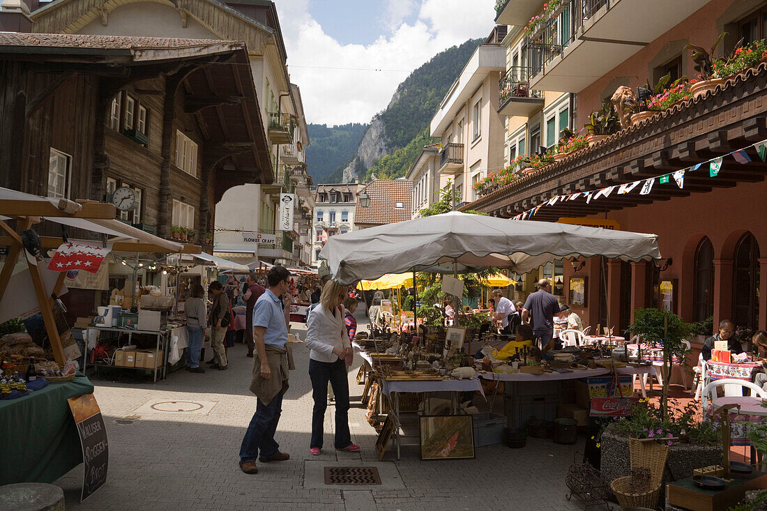 People strolling over flea market, Interlaken, Bernese Oberland (highlands), Canton of Bern, Switzerland