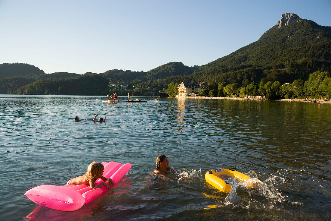 Children bathing in Lake Fuschl, Fuschl am See, Salzkammergut, Salzburg, Austria