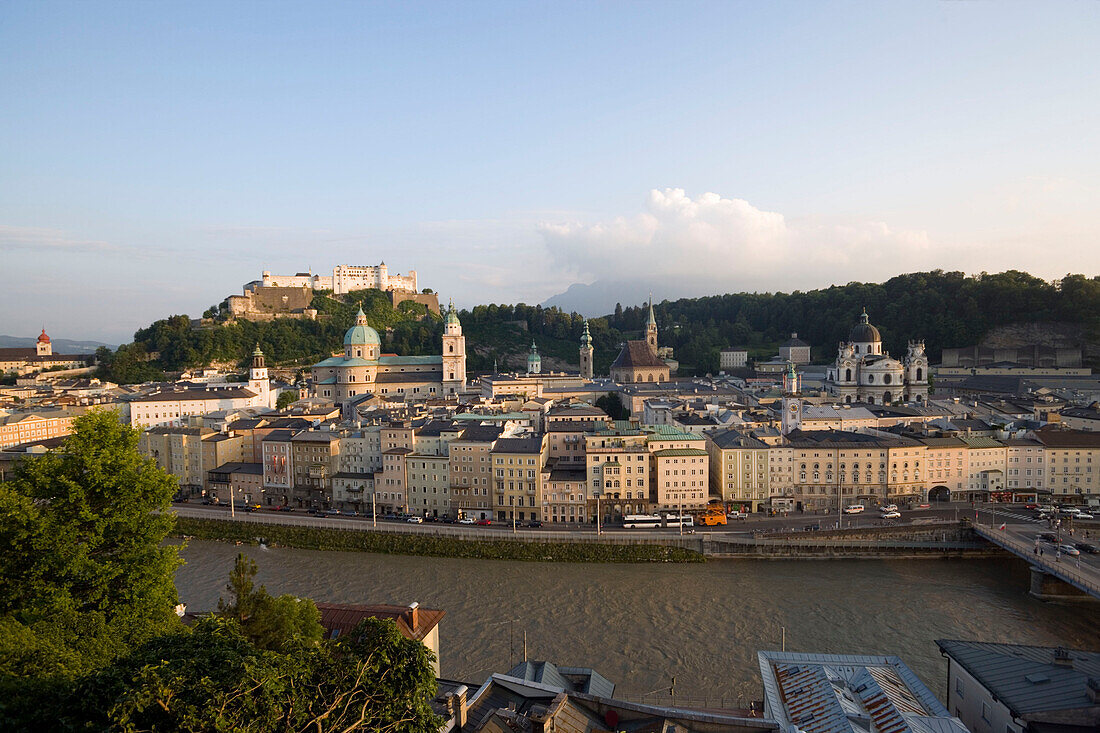 View over Salzach to Old Town with Hohensalzburg Fortress, largest, fully-preserved fortress in central Europe, Salzburg Cathedral, St. Peter's Archabbey, Franciscan Church and Collegiate Church, built by Johann Bernhard Fischer von Erlach, Salzburg, Salz