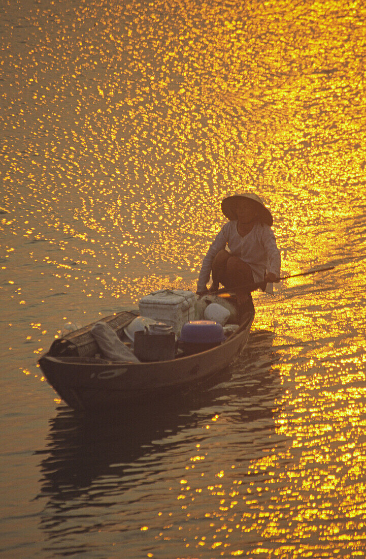 Fishing boat at sunset, rivers delta, Nha Thrang, Vietnam