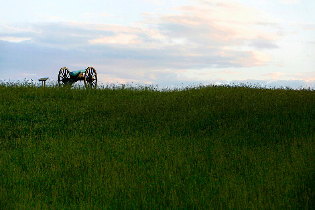 Cannon on a former battlefield at sundown, Manassas, Virginia, USA