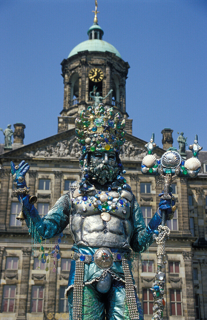 Street entertainer in front of Royal Palace, Dam, Amsterdam, Netherlands, Europe