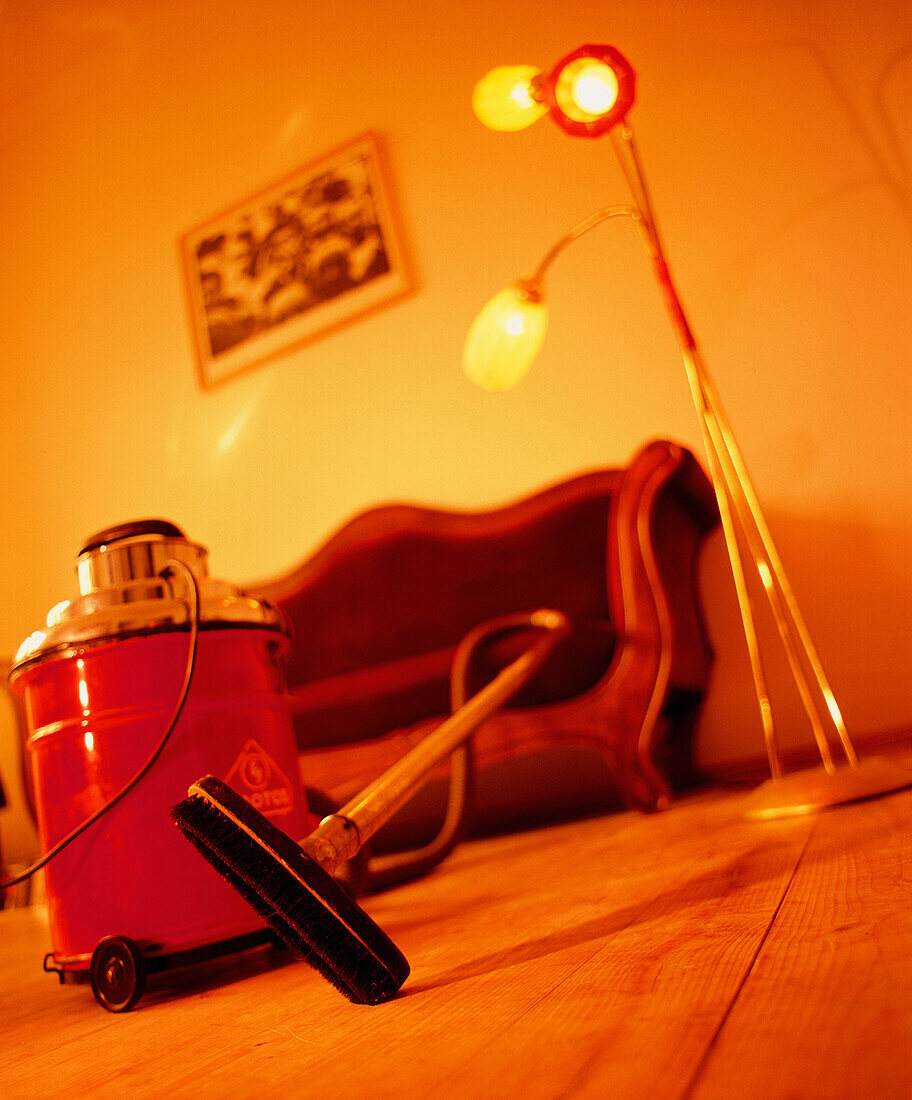 Old vacuum cleaner in a living room