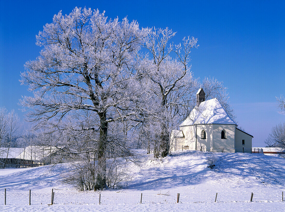 Chapel in winter near Deining, Bavaria, Germany