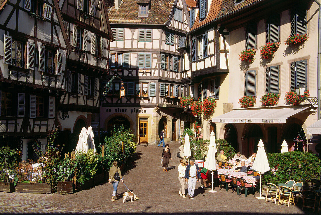 People at square at Rue des Marchands, Colmar, Alsace, France, Europe