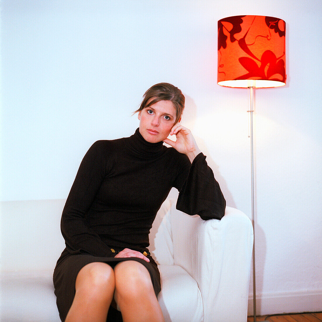 Mid adult woman sitting on a sofa