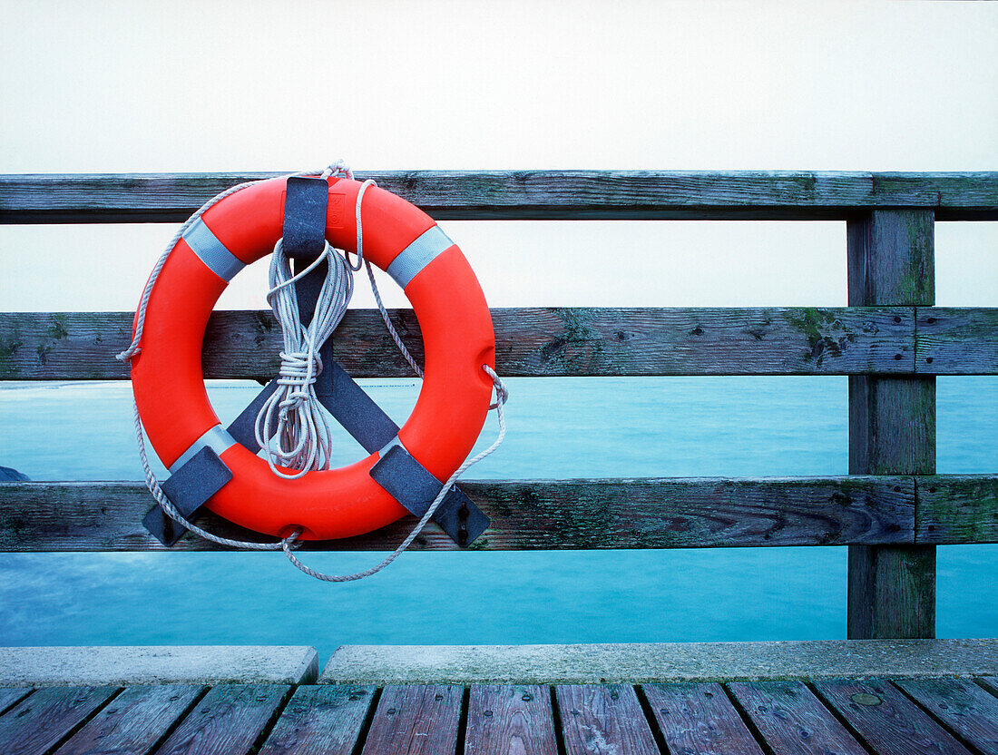 Life belt at balustrade of a pier, Dierhagen, Mecklenburg-Western Pomerania, Germany