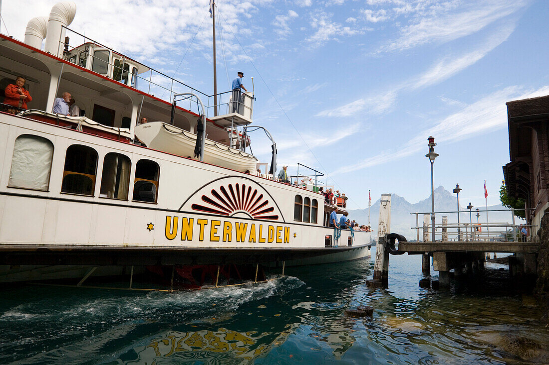 Paddle Steamer DS Unterwalden on Lake Lucerne docking into ship station, Canton of Lucerne, Switzerland