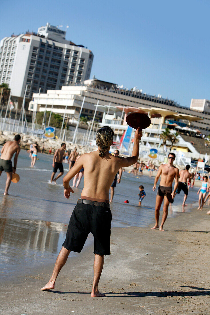 People playing games on the beach, Tel Aviv, Israel