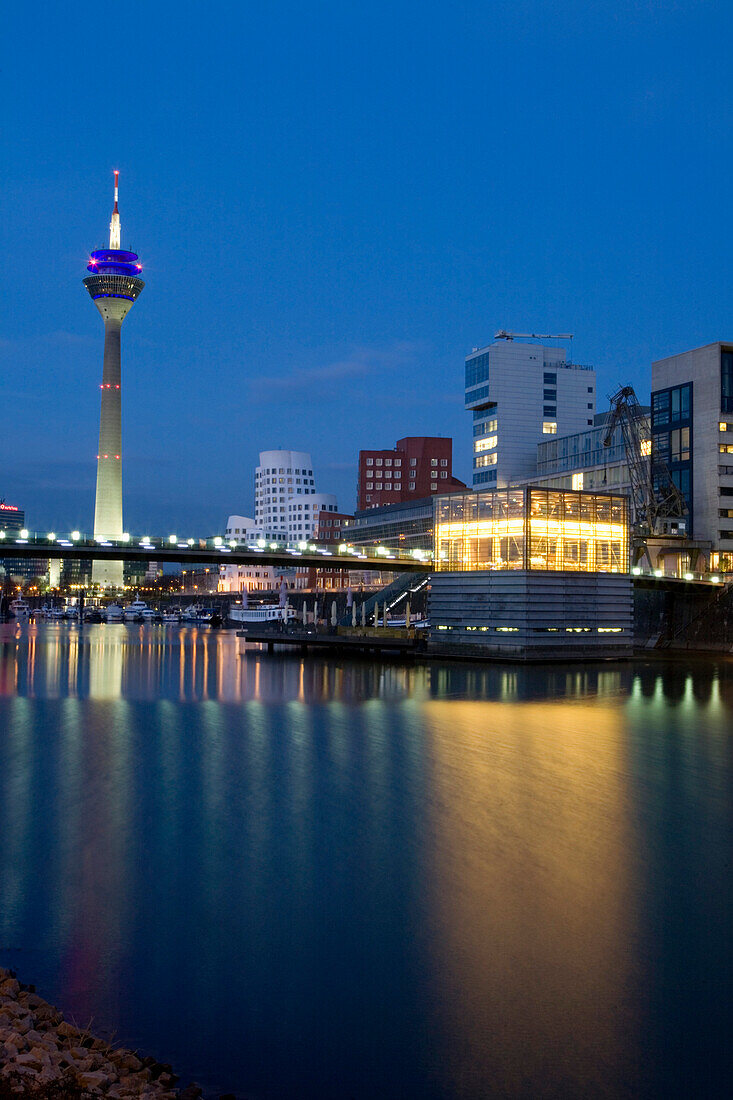 Modern architecture in the Media Harbour with television tower, Düsseldorf, state capital of NRW, North-Rhine-Westphalia, Germany