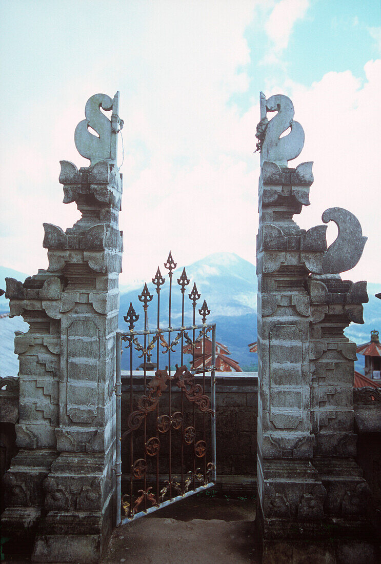 gate to a tempel, Kintamani, Bali, Indonesia, Asia, open gate, door, entrance, ornamented, view in the distance, path, invitation, mountain range, volcano, Batur in background, religion, culture, mystic, tradition