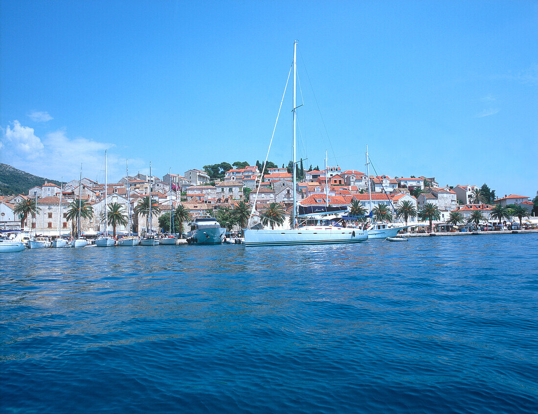 Promenade of Hvar, croatia, dalmatia, adriatic sea, coast, water, old houses, ancient, anchored ships, harbor, sightseeing, travel, vacation, holiday, trip, island, tourism, beautiful weather, sunshine, summer