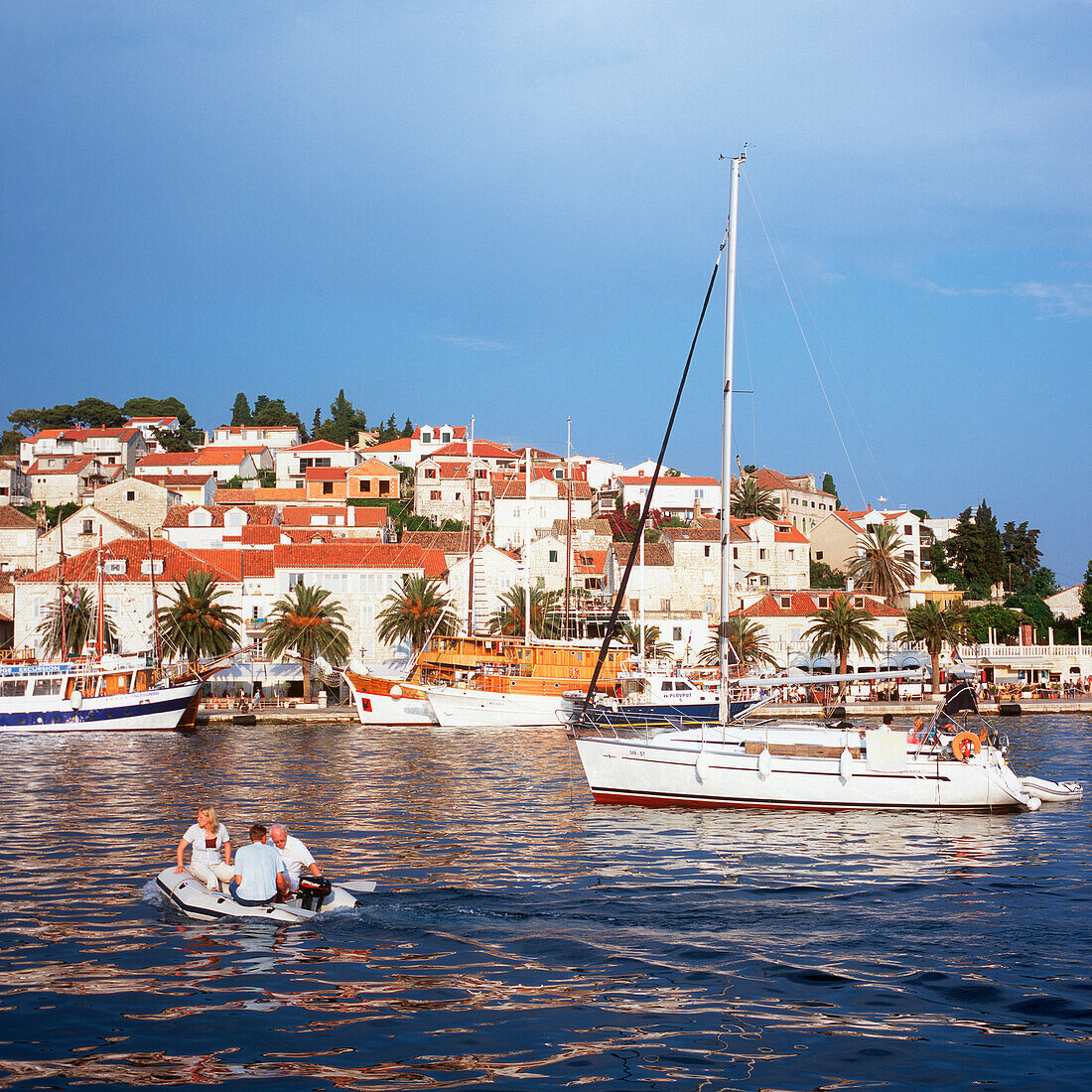 Promenade of Hvar, croatia, dalmatia, adriatic sea, coast, water, old houses, ancient, anchored ships, harbor, sightseeing, travel, vacation, holiday, trip, island, tourism, beautiful weather, sunshine, summer