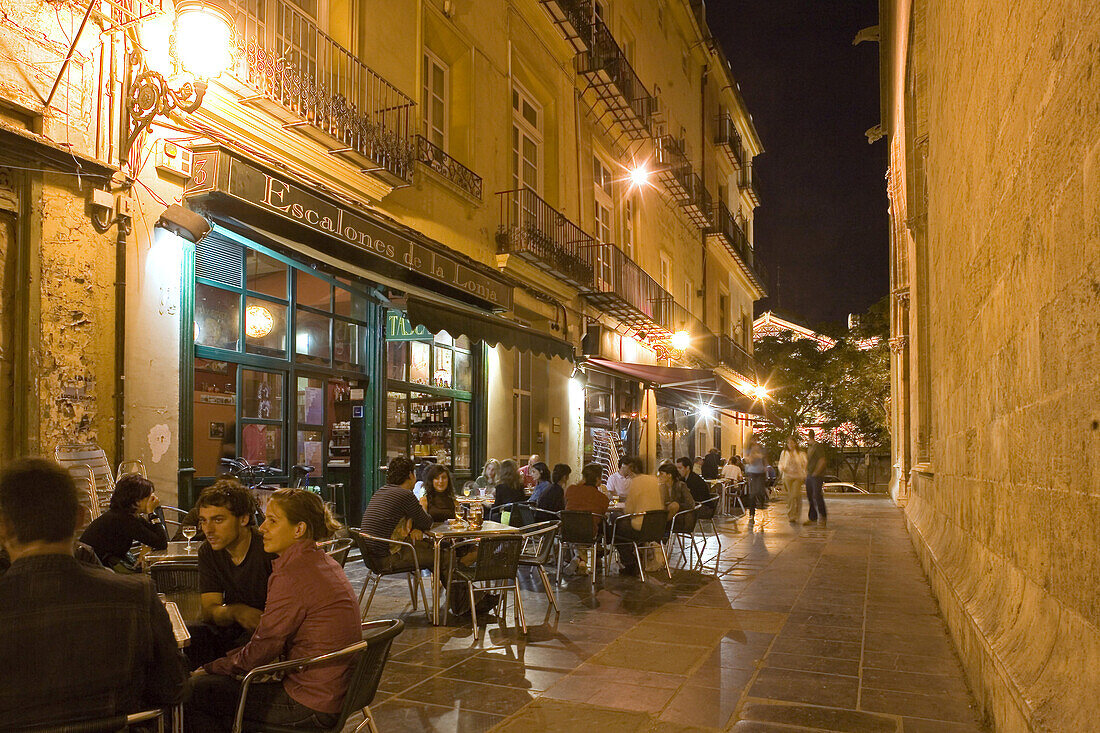outdoor cafe, young people sitting outside, old town, Valencia, Spain