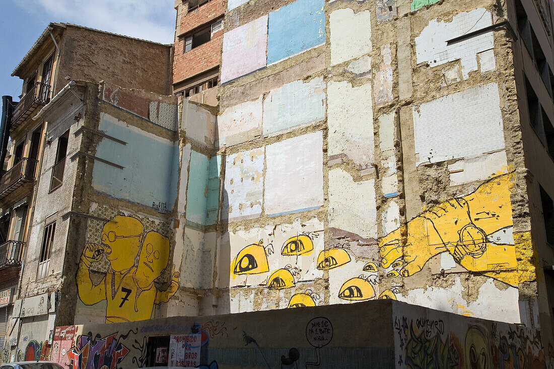 Graffiti on demolition block, house wall, old town Valencia, Spain