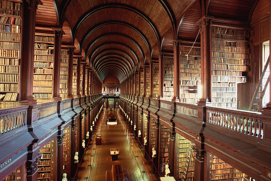 Rows of books inside Trinity College, Long Hall Library, Dublin, Ireland