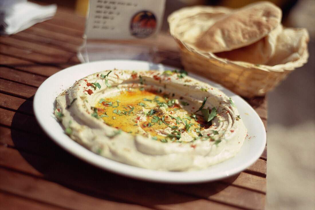 Close up of humus and pita bread, Restaurant, Tel Aviv, Israel