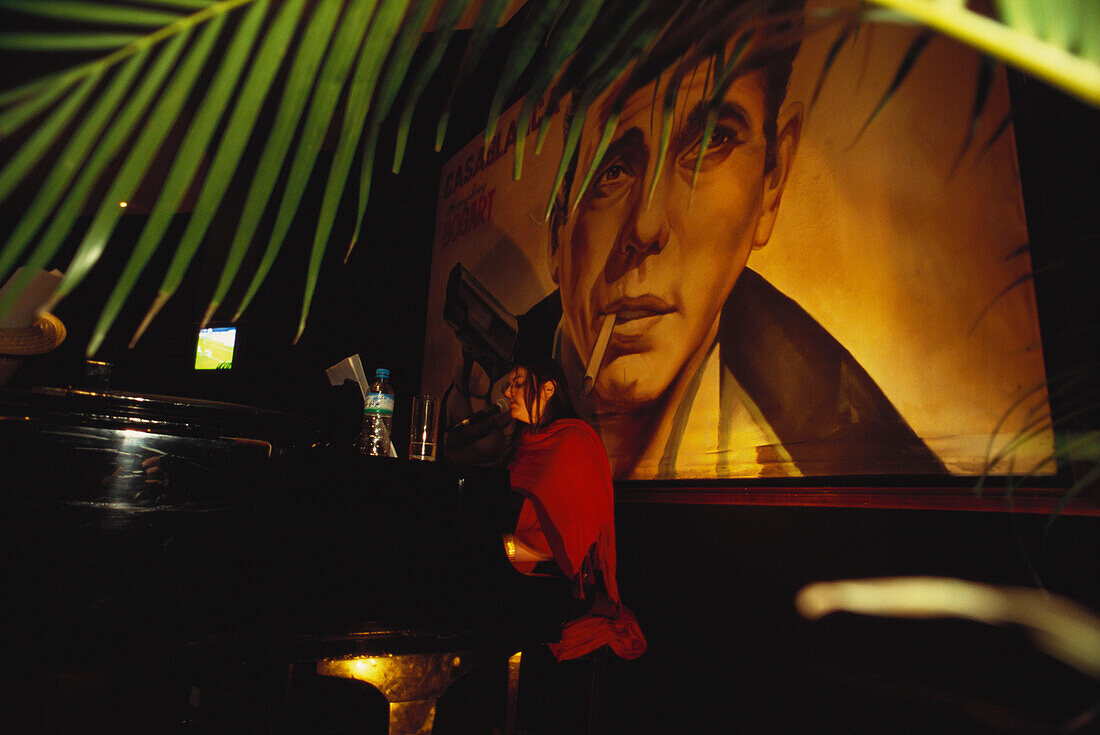 Woman sat at the bar, Rics Bar, Hyatt Regency Hotel, Casablanca, Marocco, Africa