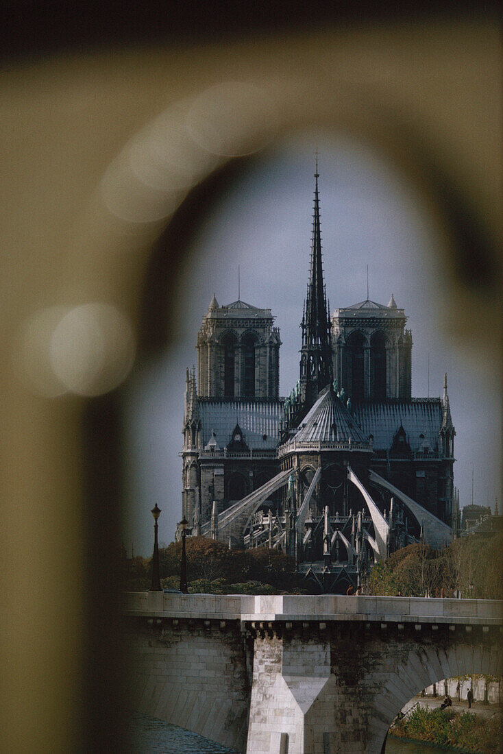 View of Notre Dame cathedral through an arch, Paris, France