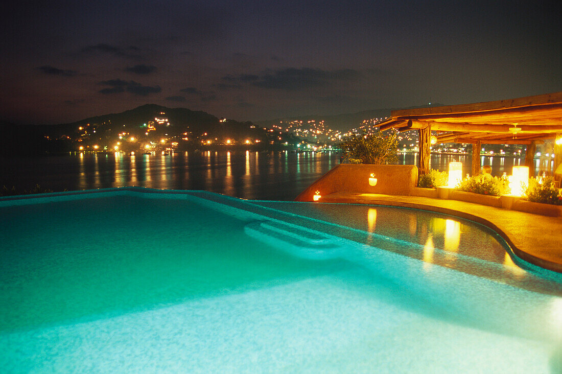 Pool area of a small luxury hotel, La Casa que canta Zihuatanejo, Mexico, America