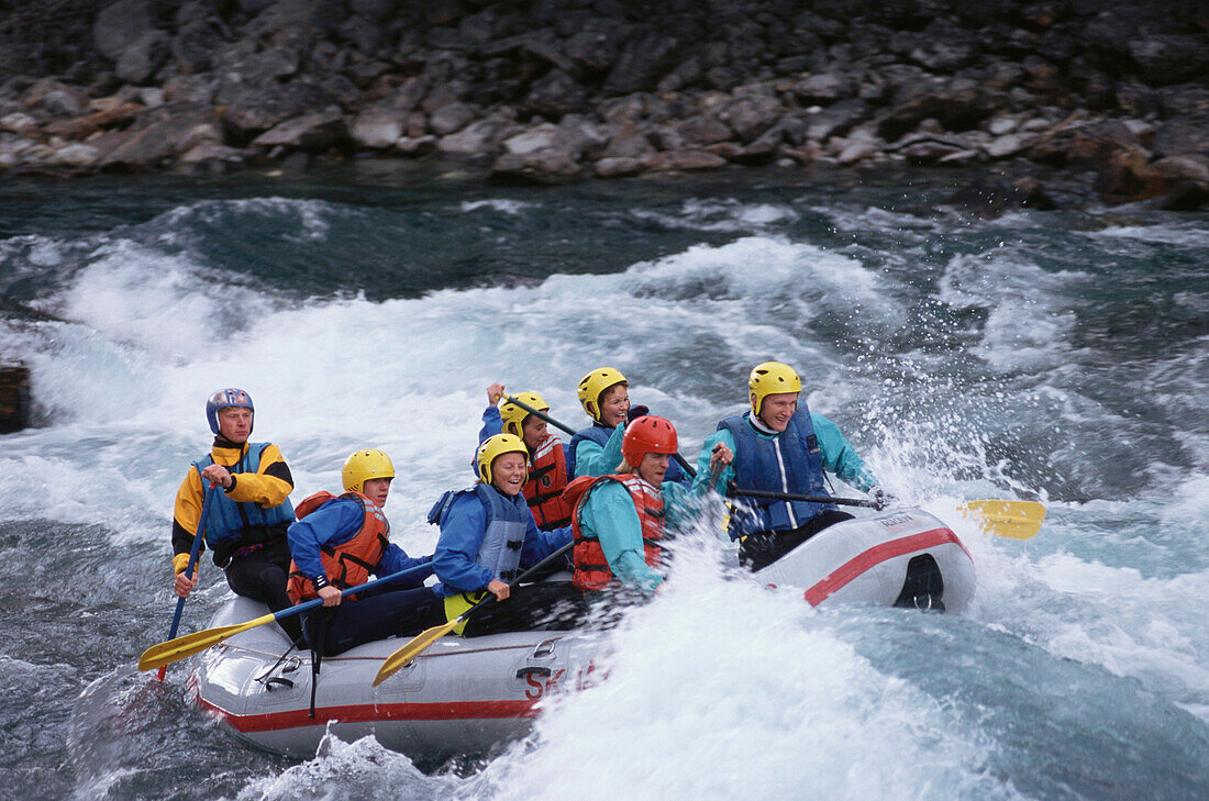 People white water rafting on the river Otta, Norway