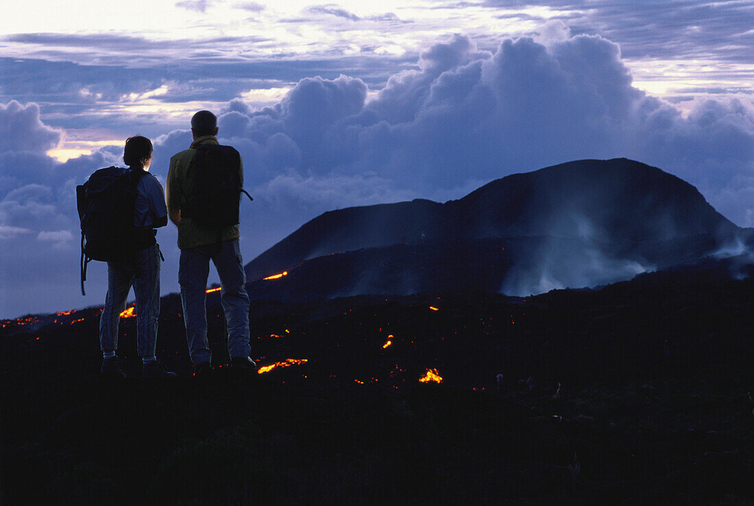 A couple standing on Piton Kapor, La Réunion, Indian Ocean, France