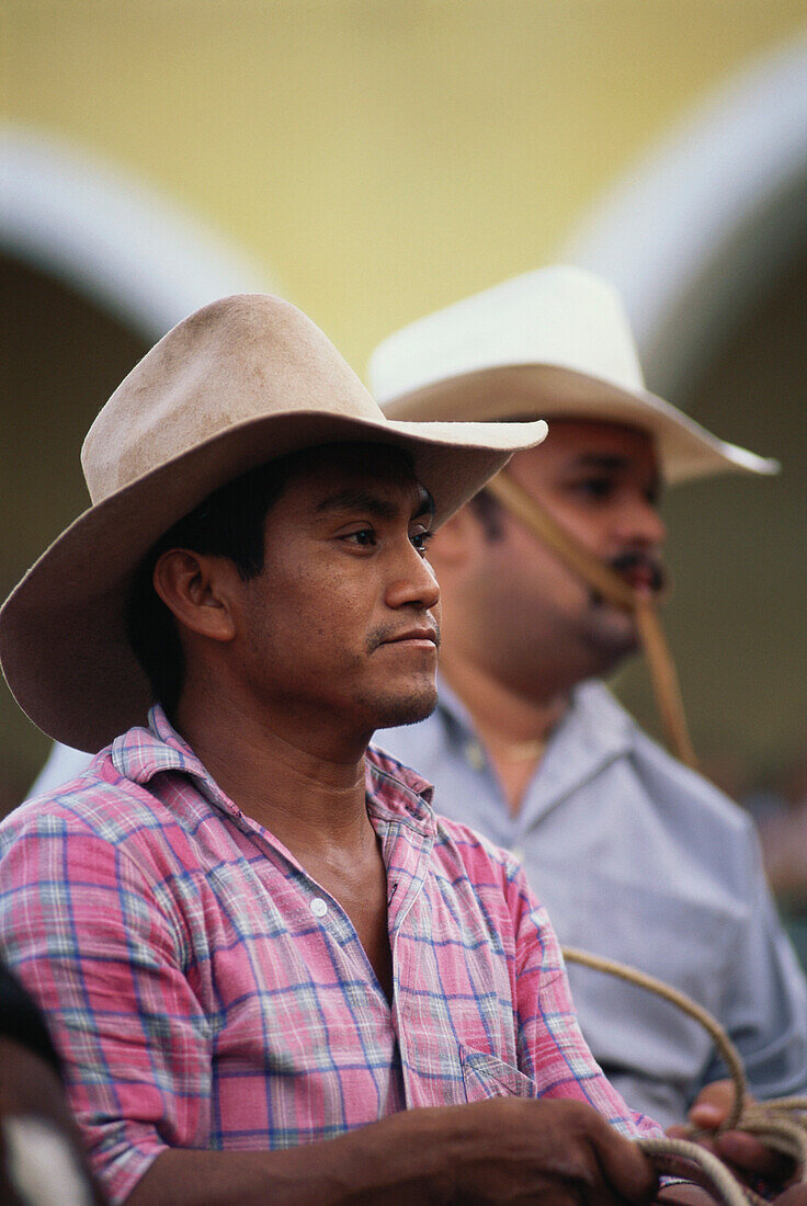 Two men helping out a the Corrida, Village Festival, Hunucma, Yucatan, Mexico