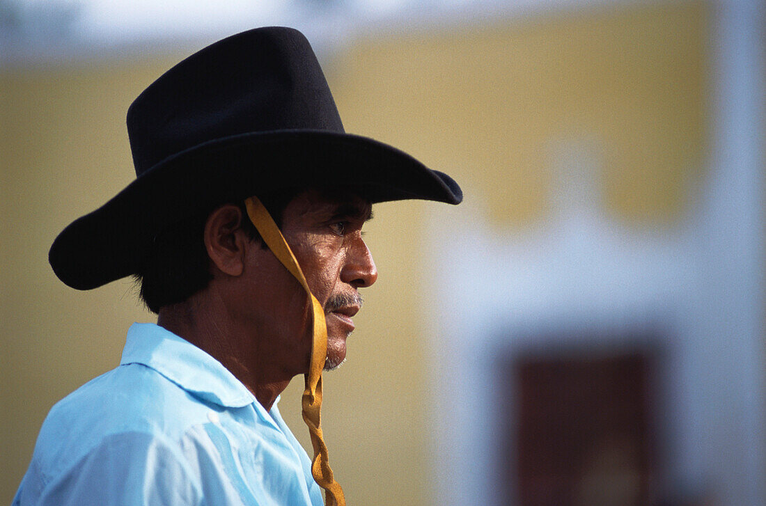 Local man helping out at the Corrida, village festival, Hunucma, Yucatan, Mexico