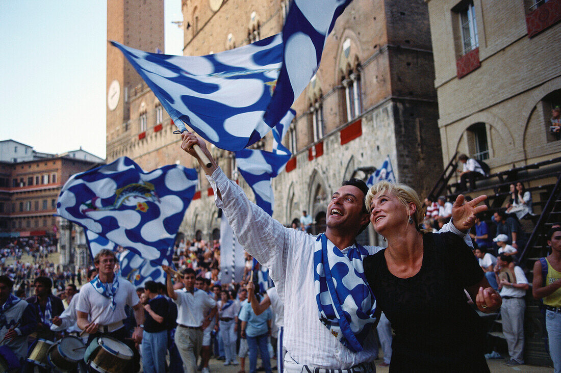 Palio, emotions of the winners, Piazza del Campo, Siena, Tuscany, Italy