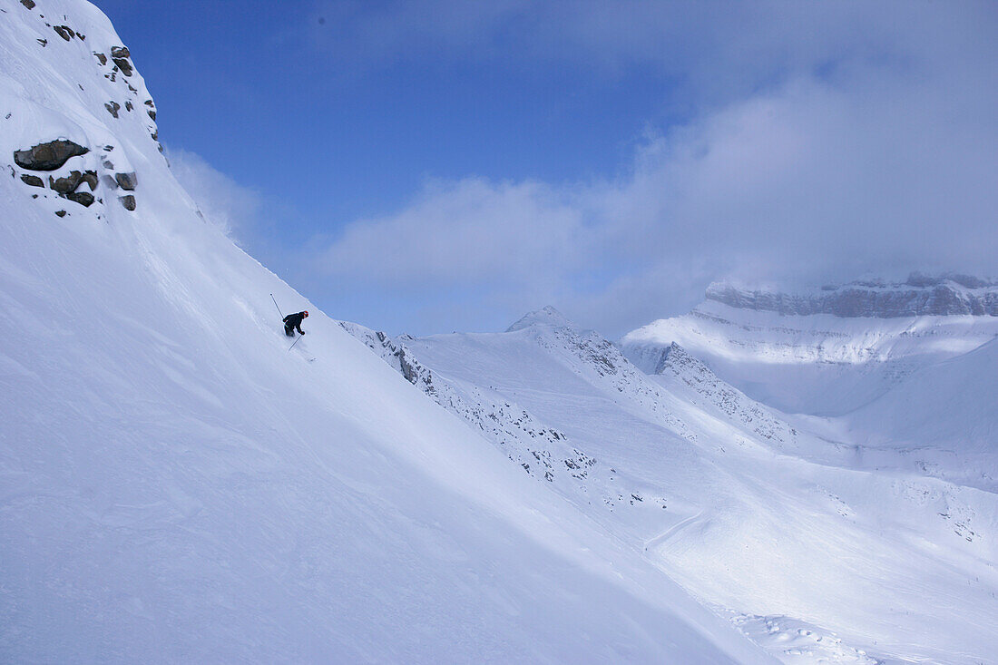 Skier in deep snow, Lake Louise, Alberta, Canada