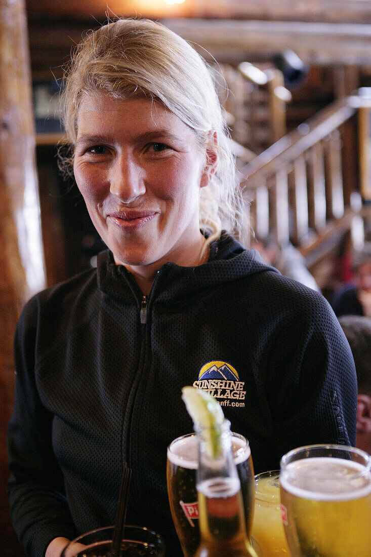 A waitress in Mad Trappers Saloon, Sunshine Village Ski Resort, Alberta, Canada