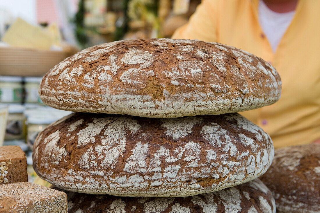 Freshly baked rye bread at a garden festival at Fasanerie Castle near Fulda, Hesse, Germany