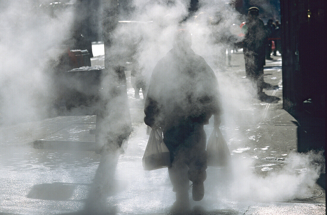 Diverting steam on a Manhattan street. The underground steam network is owned by Con Edison and is still used to power elevators for example. Diverting the steam is necessary during repairs in order to reduce pressure