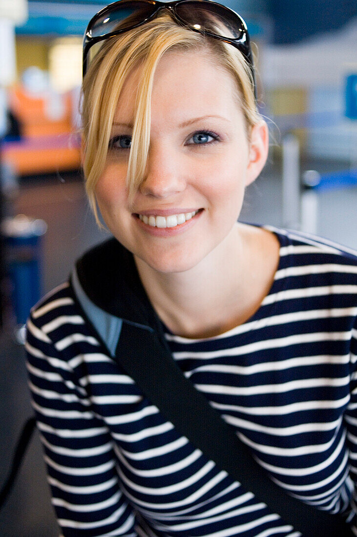Young woman smiling at camera, Luxembourg