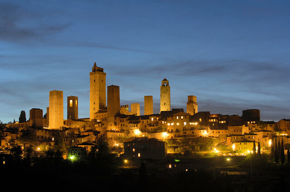 Panorama of a small medieval town at night, San Gimignano, Tuscany, Italy