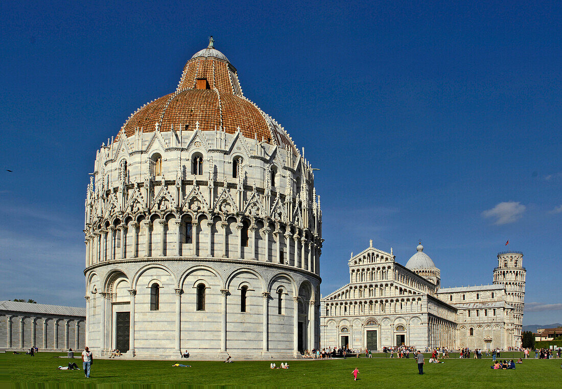 Piazza dei Miracoli and Baptistry of St. John with Leaning Tower of Pisa in the background, Pisa, Tuscany, Italy