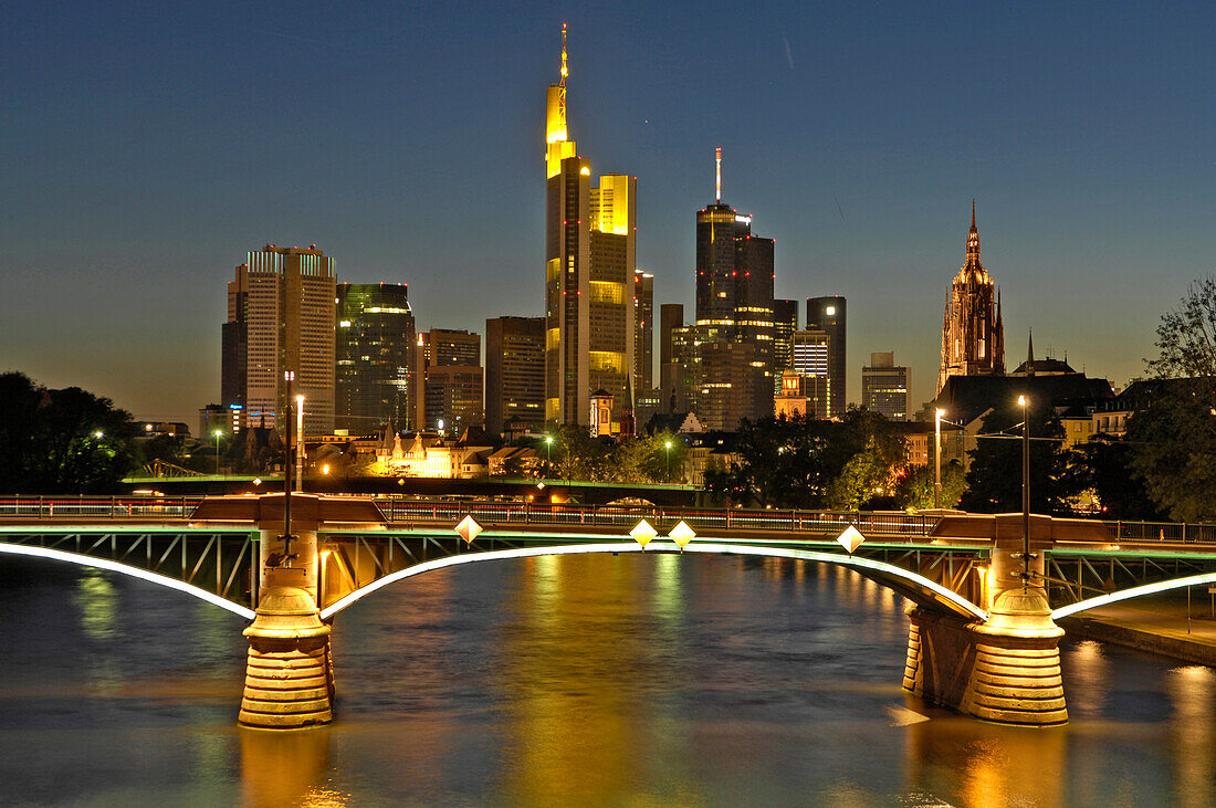 Skyline with Main river, Ignaz-Bubis bridge and commerz bank in the background, Frankfurt, Hesse, Germany