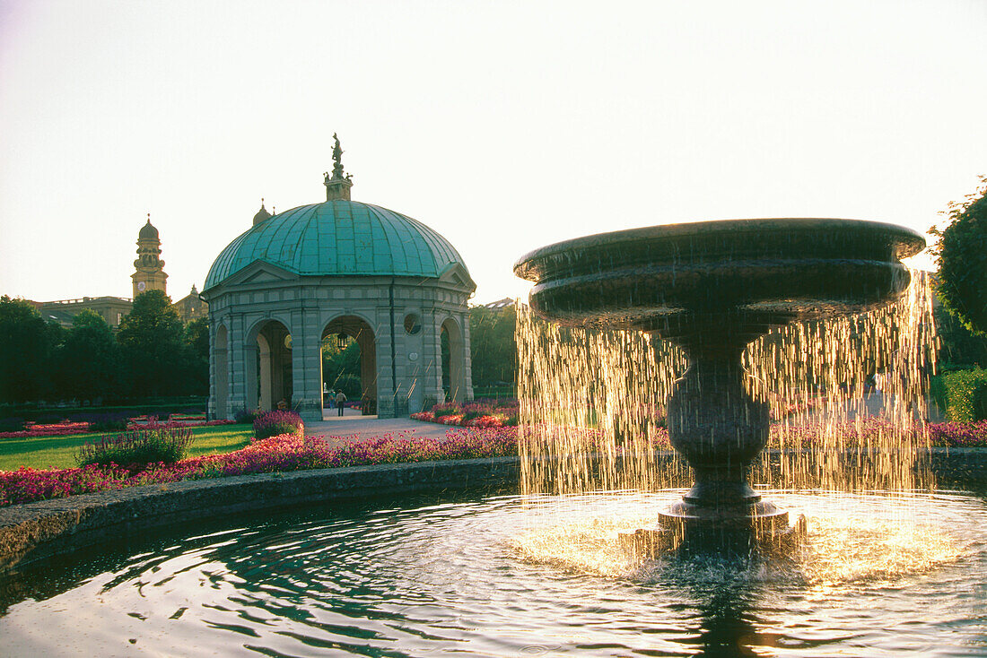 Pavilion and sunlit fountain at Hofgarten, Munich, Bavaria, Germany