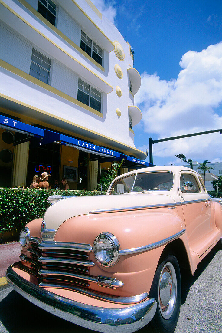 Vintage car infront of Art Deco house, Collins Avenue, South Beach, Miami, Florida, USA