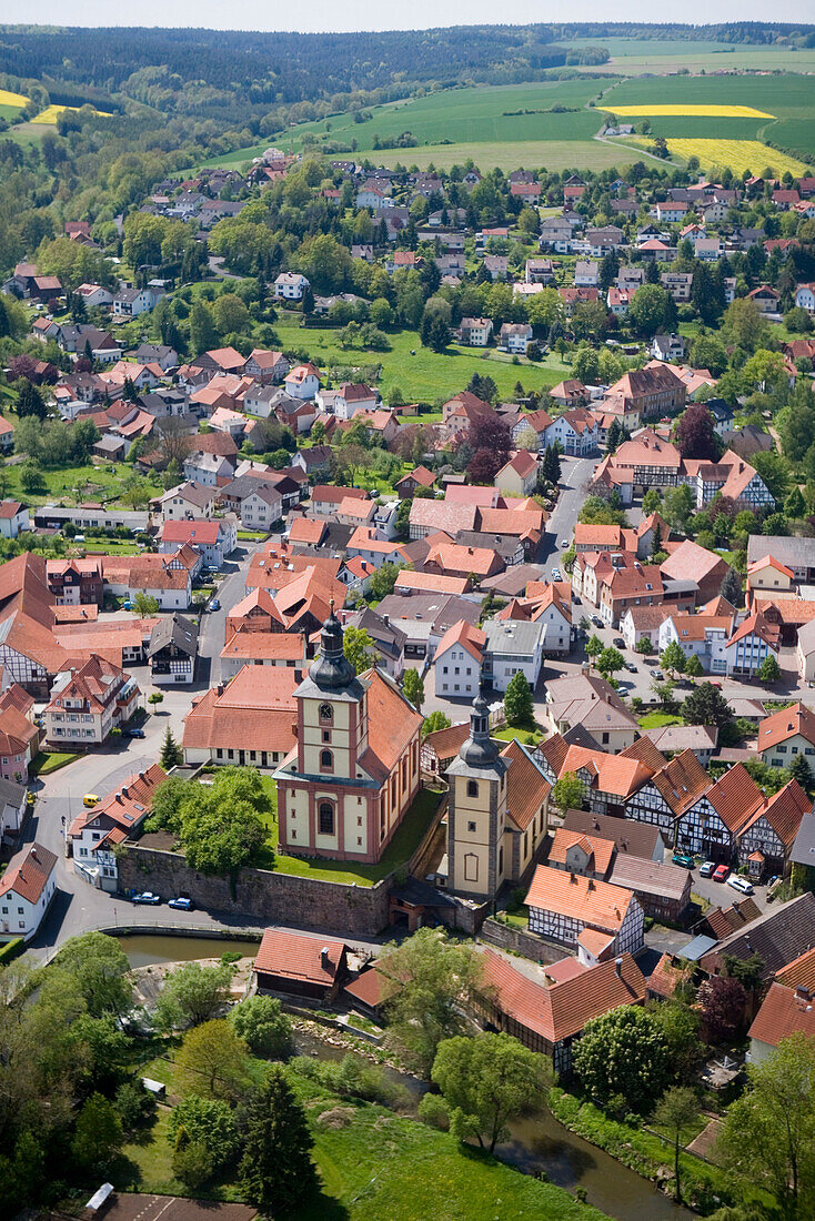 Aerial photo of Burghaun with Catholic and Protestant Church, Burghaun, Hesse, Germany