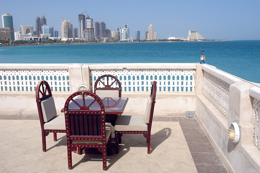 Restaurant at Doha Bay with skyline in the background, Qatar