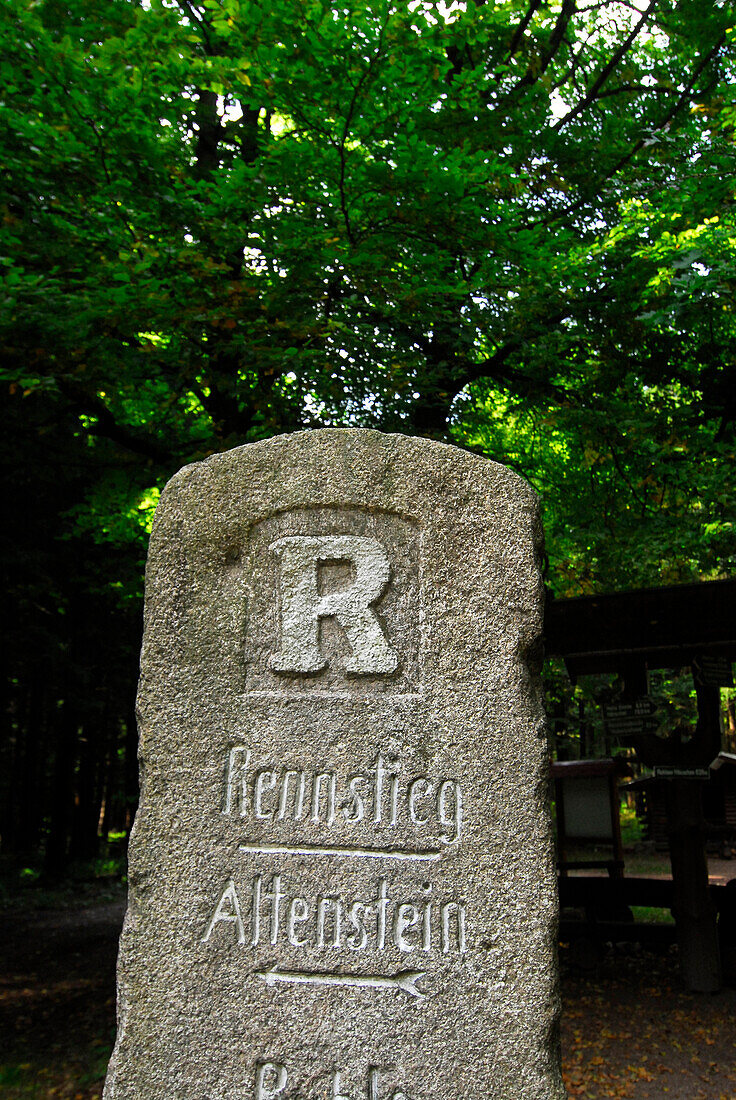 Stone showing directions for walking at Rennsteig near Ruhla, Thuringia, Germany