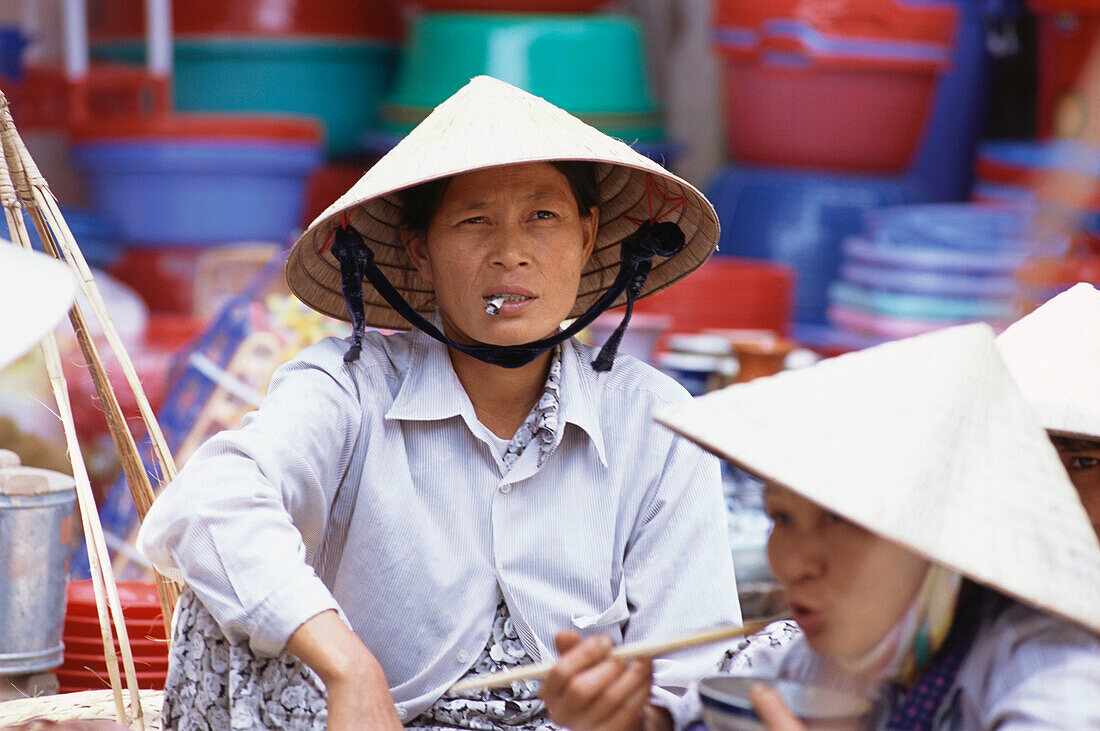A female vendor, Market, City Scape. Hoi An, Vietnam