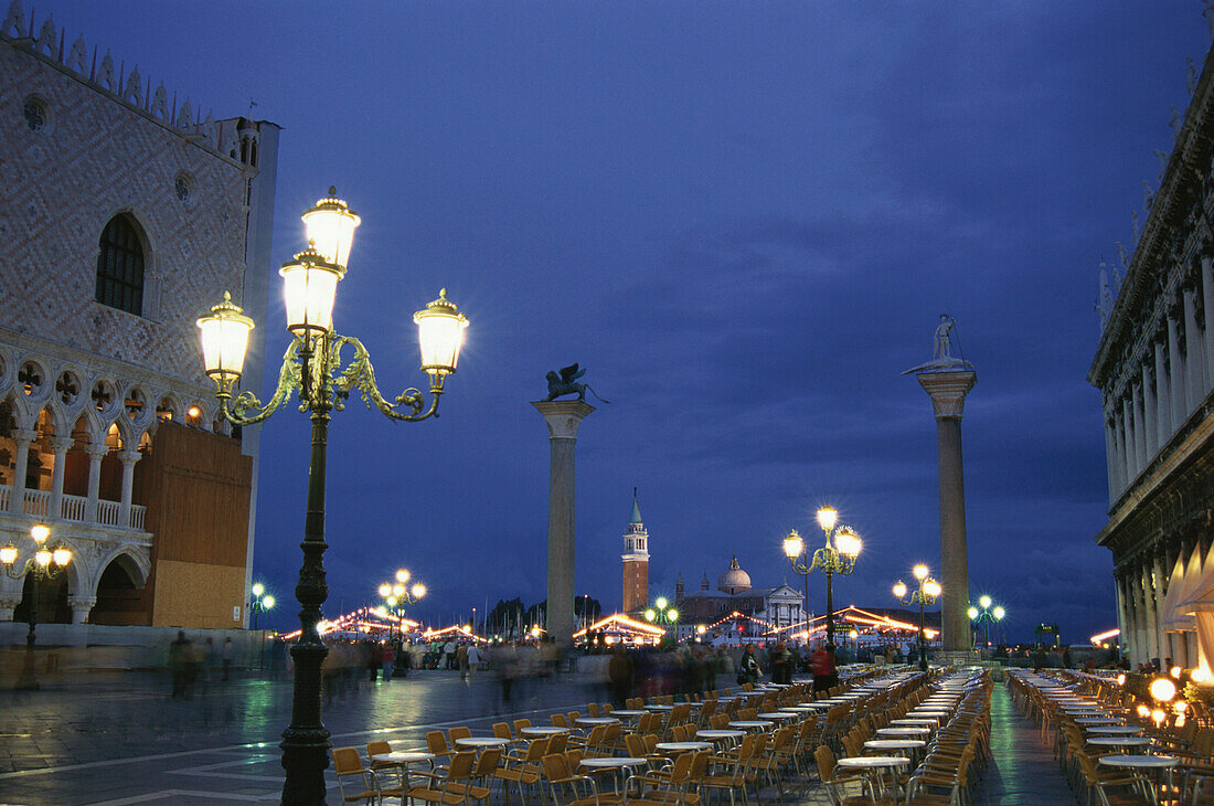 View of Piazza San Marco at night with cafes, Venice, Italy