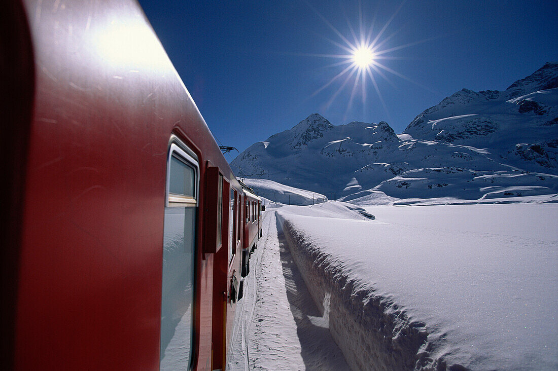 Rhaetian Railway in winter, Engadin, Canton of Grisons, Switzerland