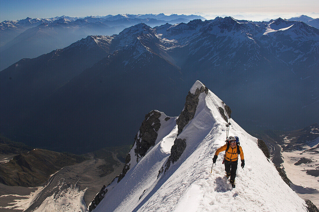 Mountaineer climbing north wall of mount Ortler, Trentino-Alto Adige, Italy