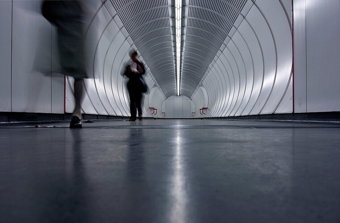 People walking over in metro station, Vienna, Austria