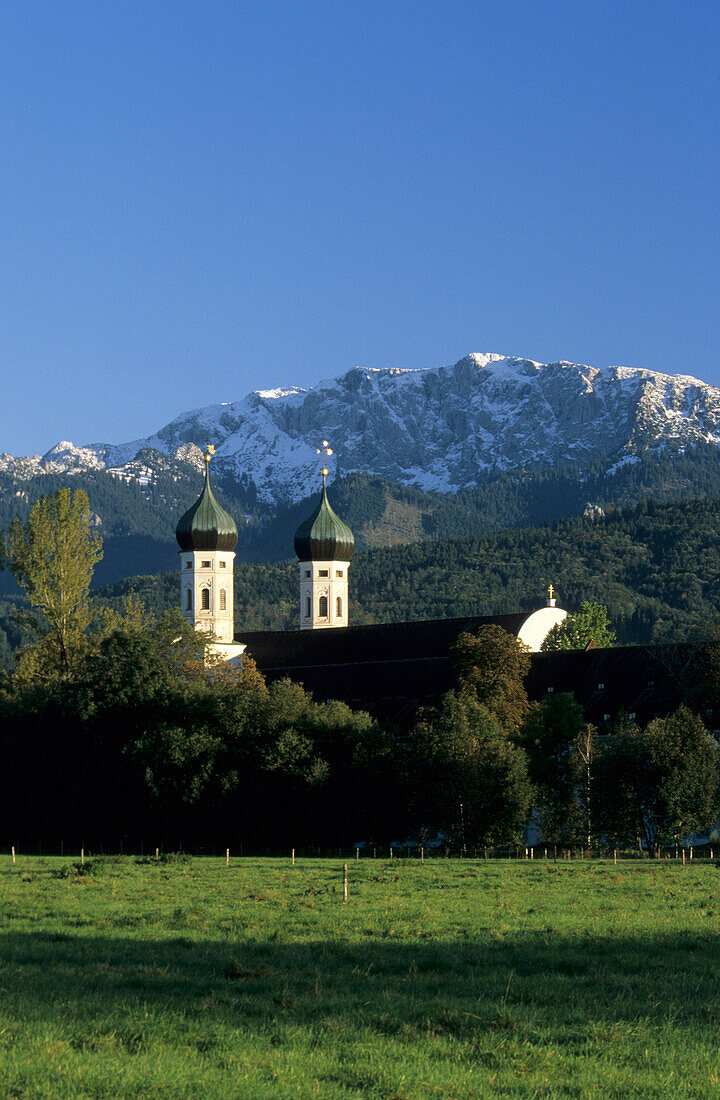 Church and monastery of Benediktbeuern with view to snow-covered Benediktenwand, Benediktbeuern, Bavarian range, Upper Bavaria, Bavaria, Germany