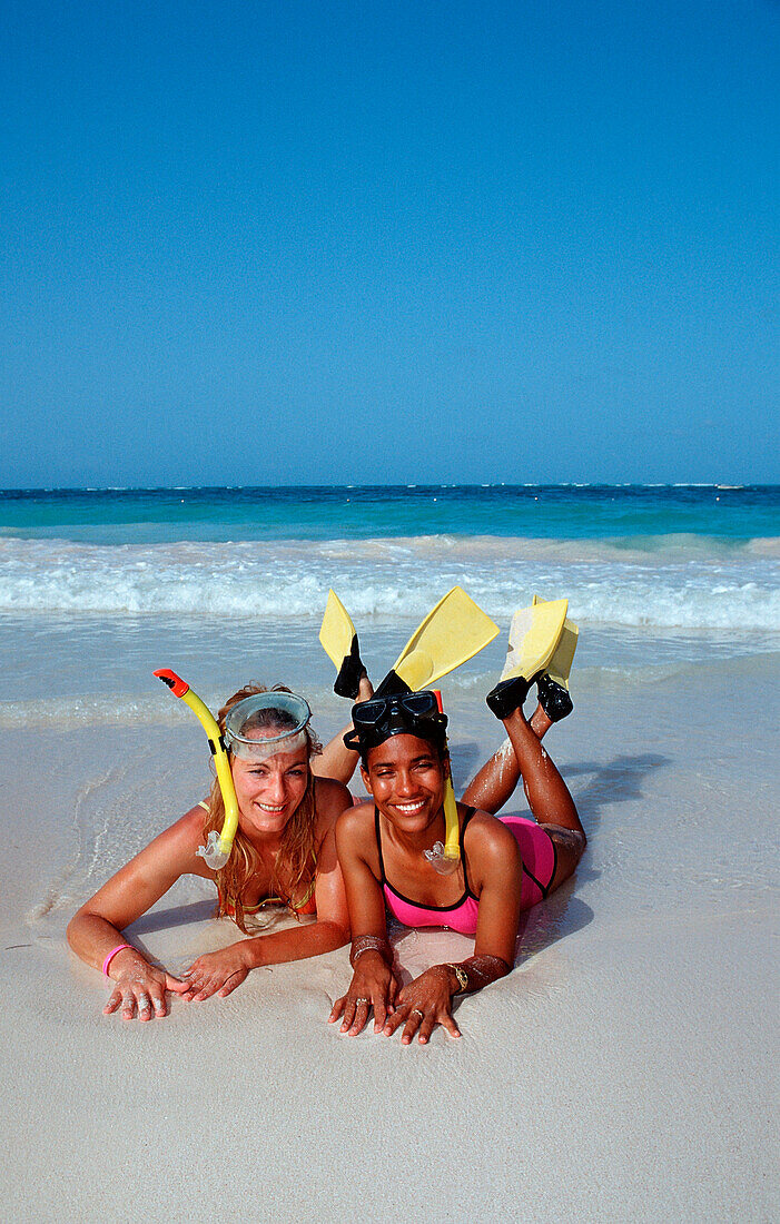 Two female scin diver on the beach, Punta Cana, Caribbean, Dominican Republic