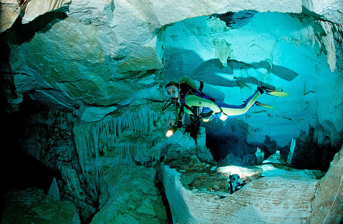 Scuba diver in underwater cave Cueva Taina, Punta Cana, Freshwater, Dominican Republic